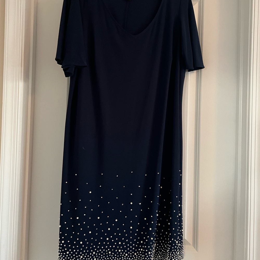 Navy blue evening dress with sparkle detailing.